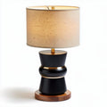 Black and gold table lamp with linen shade and wooden base 30 x 30 x 60cm